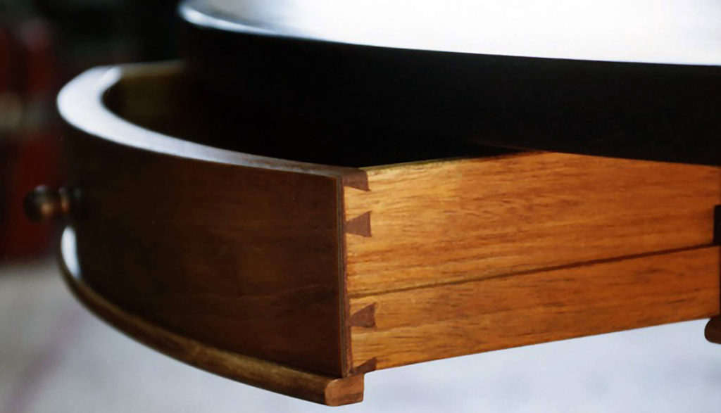 Detail-of-a-circular-table-drawer